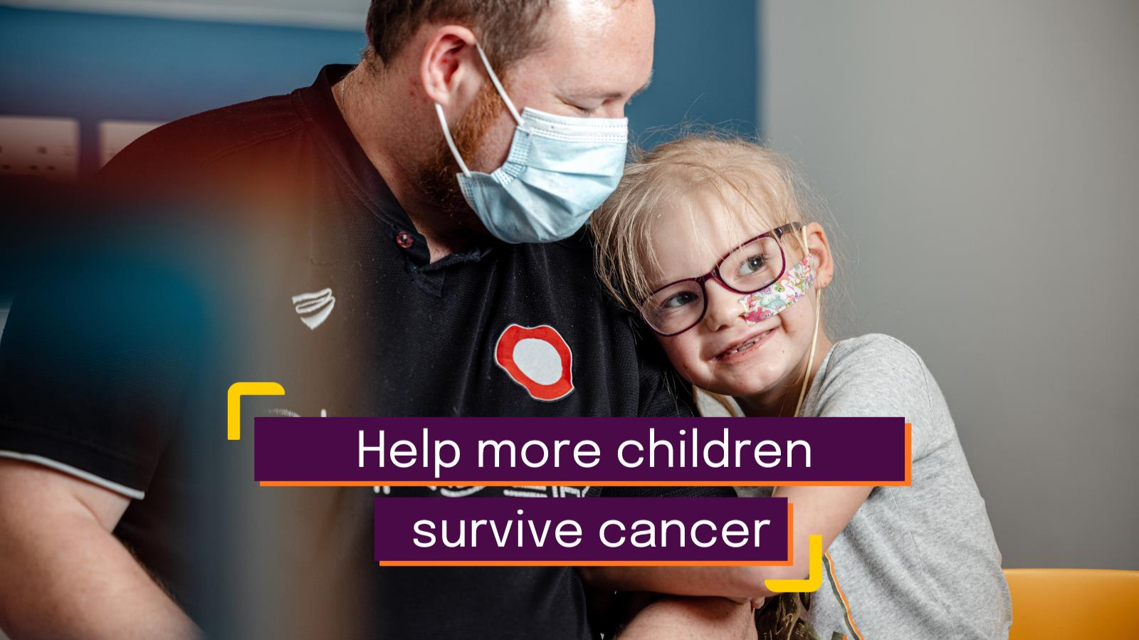 Two individuals, an adult male wearing a black shirt and a child. The child has a tube in her nose, and is hugging the adult. A caption in the image reads 'Help more children survive cancer'.